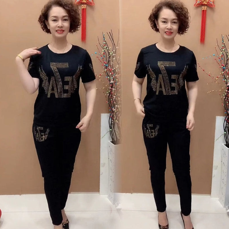 🔥 【Rabat 50%】 💥 【M-4XL】Damski komplet z koszulką i długimi spodniami