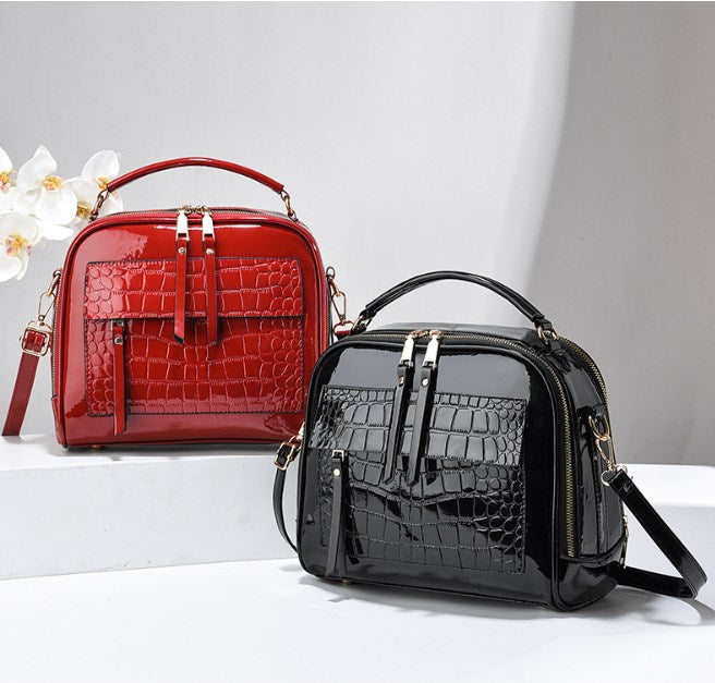👜👜 【Oferta por tiempo limitado -50%】Bolso de mano elegante de cuero charol con estampado de cocodrilo