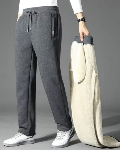 👖 【50% taniej przez ograniczony czas】Nowe zimowe męskie spodnie sportowe 2025 z grubym ociepleniem z futerka owczego