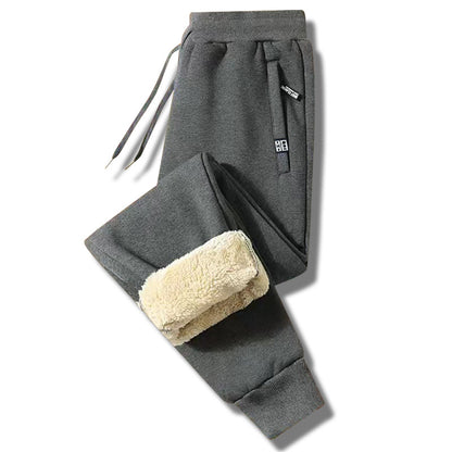 👖 【50% taniej przez ograniczony czas】Nowe zimowe męskie spodnie sportowe 2025 z grubym ociepleniem z futerka owczego