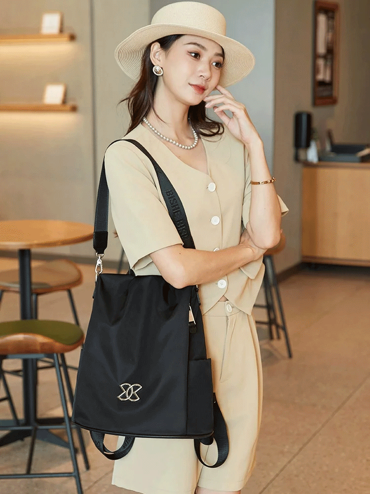 🔥🔥🎒【Compre 1 y llévese 1 gratis】 Bolso bandolera de tela Oxford ligero, multifuncional, de gran capacidad y antirrobo.