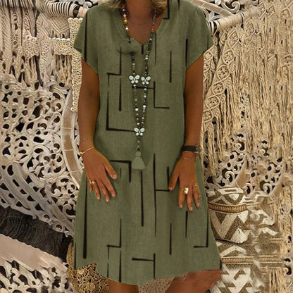 🌲【Kúp jeden, druhý dostaneš zadarmo】👗【S–5XL】Nové šaty s potlačou do V z bavlny a ľanu 🌿Priateľské k pokožke a mäkké