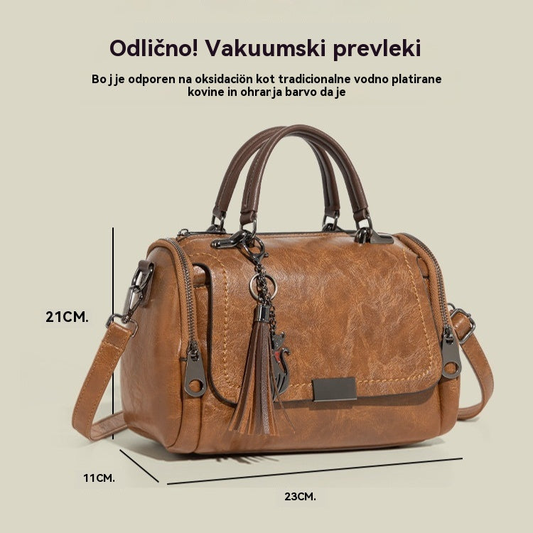 Ženska torba čez telo z resicami v retro slogu in enobarvnim patchworkom, 2026