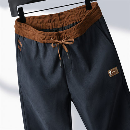 🔥🔥【Descuento de temporada 50%】Pantalones casuales de hombre con forro polar 2025