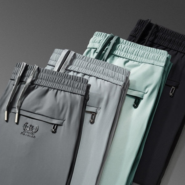 💥🧊😍【M-5XL】Pantalones casuales de seda helada para hombre, tejido suave y cómodo, transpirable y de secado rápido.