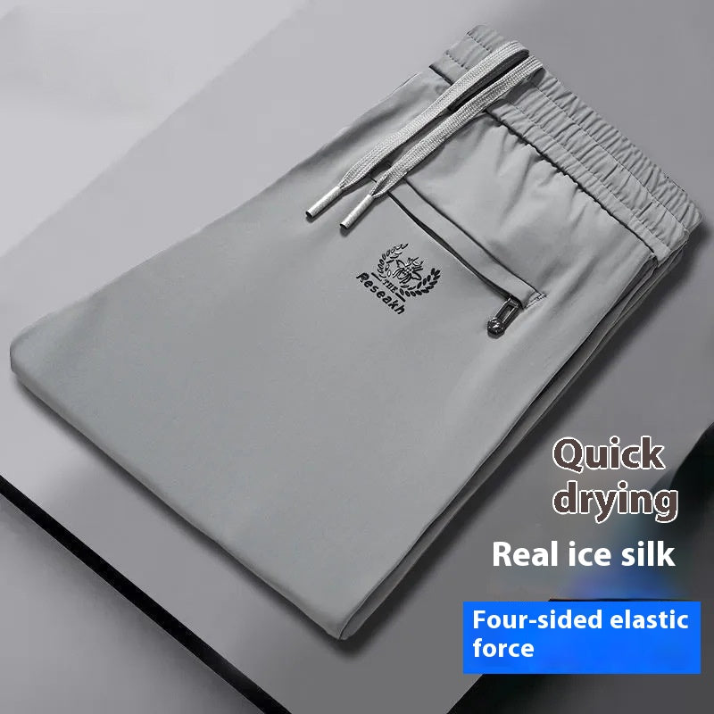 💥🧊😍【M-5XL】Pantalones casuales de seda helada para hombre, tejido suave y cómodo, transpirable y de secado rápido.