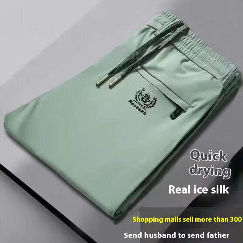 💥🧊😍【M-5XL】Pantalones casuales de seda helada para hombre, tejido suave y cómodo, transpirable y de secado rápido.