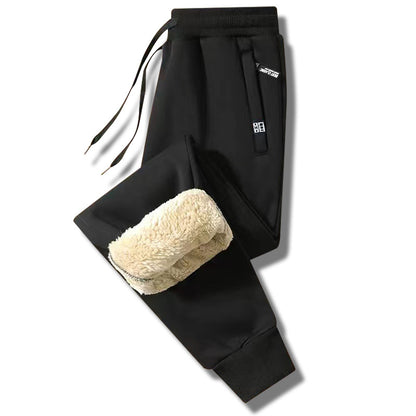 👖 【50% taniej przez ograniczony czas】Nowe zimowe męskie spodnie sportowe 2025 z grubym ociepleniem z futerka owczego