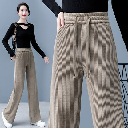 🔥【Compre uno y llévese otro gratis】 👖Nuevos pantalones casuales de terciopelo con perneras anchas, muy cómodos de usar.