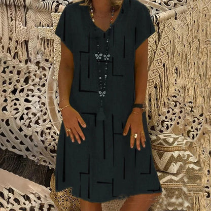 🌲【Kúp jeden, druhý dostaneš zadarmo】👗【S–5XL】Nové šaty s potlačou do V z bavlny a ľanu 🌿Priateľské k pokožke a mäkké