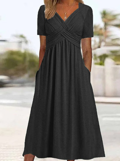 👗Kúpte jeden a druhý dostanete zadarmo🌷【S-3XL】Jarné a letné šaty 2025, nový štýl, jednofarebný, s výstrihom do V, jednoduché, elegantné, ležérne