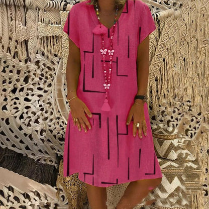 🌲【Kúp jeden, druhý dostaneš zadarmo】👗【S–5XL】Nové šaty s potlačou do V z bavlny a ľanu 🌿Priateľské k pokožke a mäkké